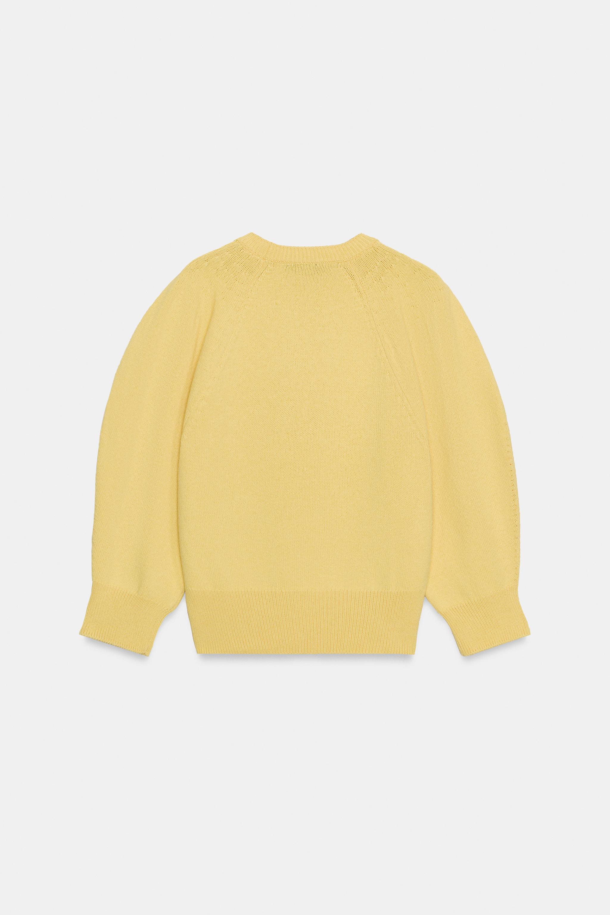 PULL EN MAILLE À MANCHES BOUFFANTES